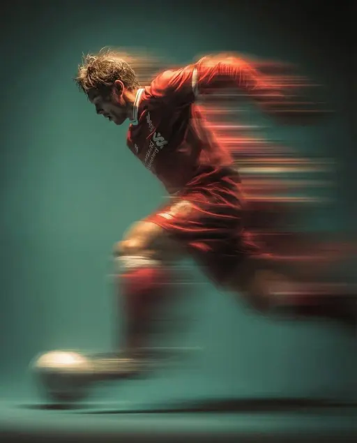 Schwenkaufnahme eines mysteriösen Fußballspielers in rotem professionellen Fußba...