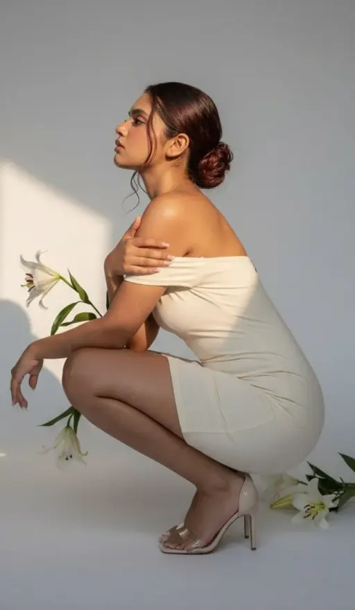 Role: high-end fashion editorial photographer shooting a luxury minimalist studi...